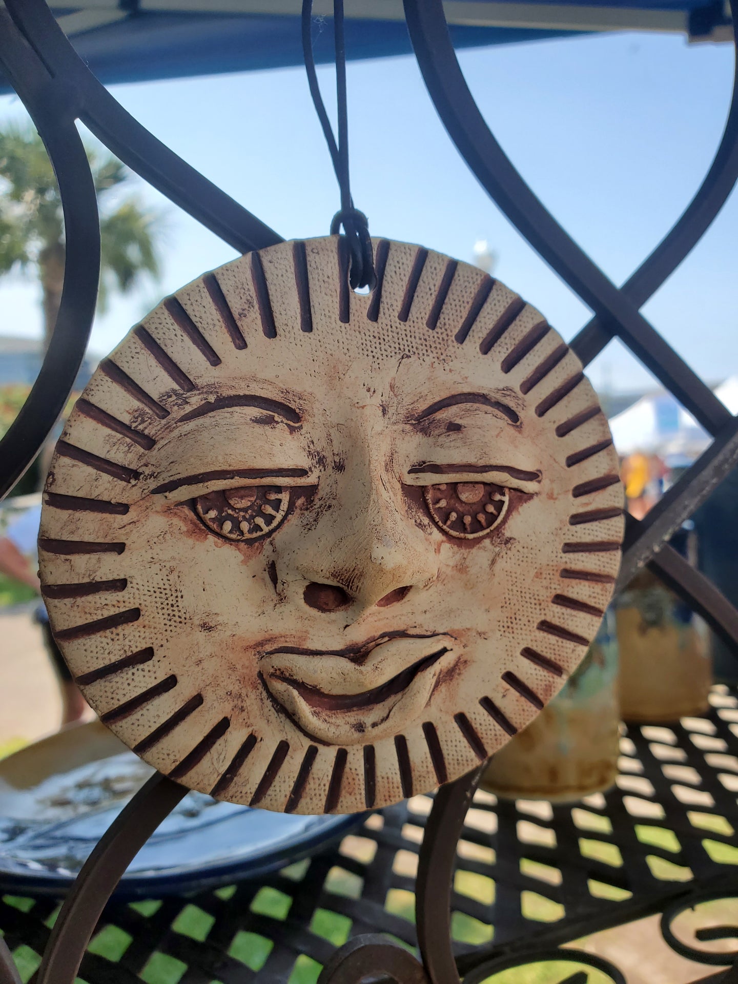 sun face ceramic wall disc